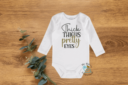 Baby Long Sleeve Onesie - Thick Thighs Pretty Eyes